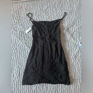 Aritzia black mini dress - never worn with tags